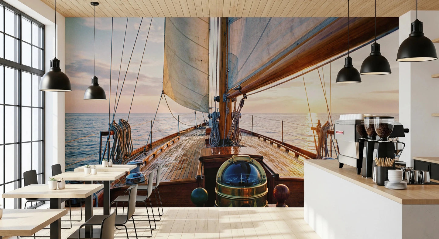 Sailing at Sunset Wall Mural featuring a warm golden glow.