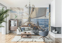 Blue and white maritime wallpaper with detailed sailboat silhouettes.