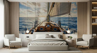 Sailing away wall mural with a soft blue sky and ocean horizon.