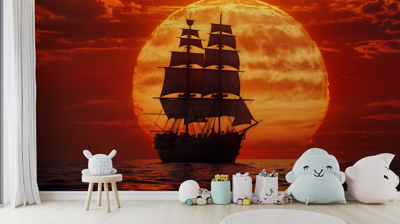 A beautiful sailing boat wallpaper mural at sunset.

