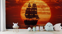 A beautiful sailing boat wallpaper mural at sunset.

