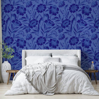 The mural is created for an entire wall, providing a sophisticated backdrop.

