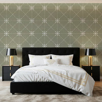 Muted green wall in Sashiko Hana-Goshi Wallpaper with handcrafted detail