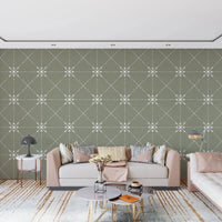 Living room styled in Flower Stitch Sage Wallpaper with geometric motif repeat