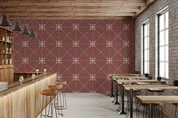 Repeating floral grid in Flower Stitch Terracotta Wallpaper with folk style