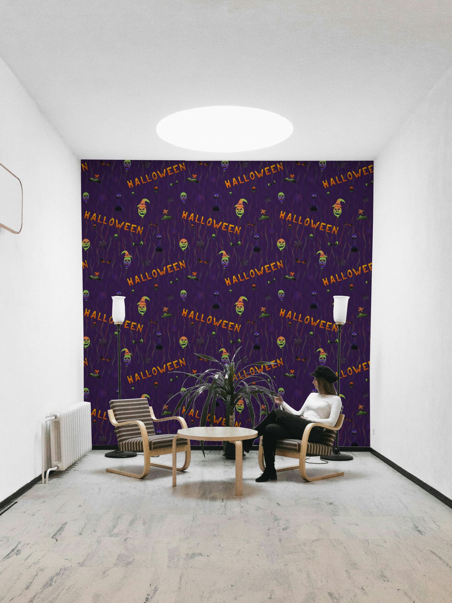 A party room decorated with a Halloween Purple Wallpaper

