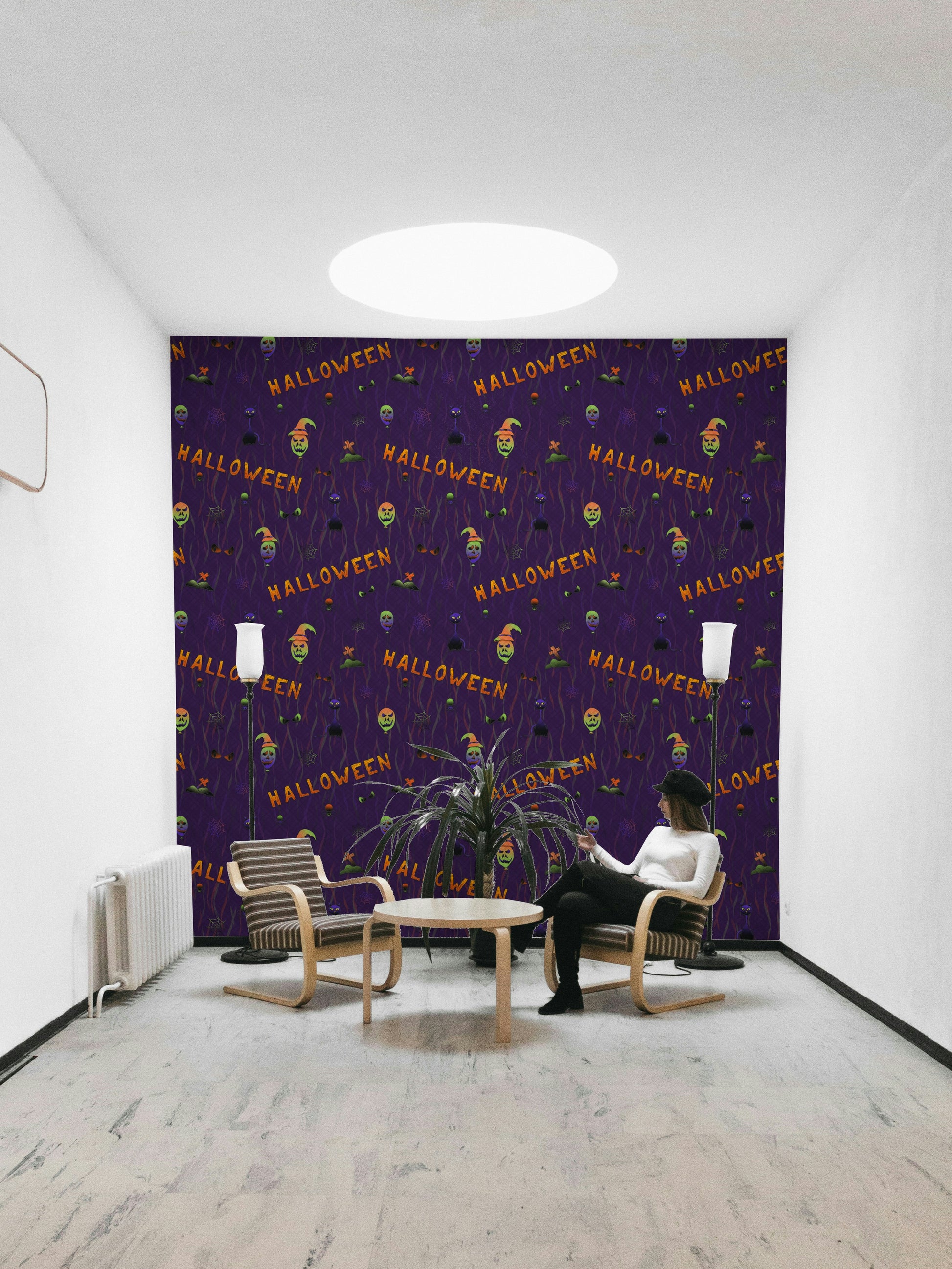 A party room decorated with a Halloween Purple Wallpaper


