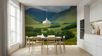 Lush green slopes and cloudy sky of Scottish Highlands Vista Wall Mural.