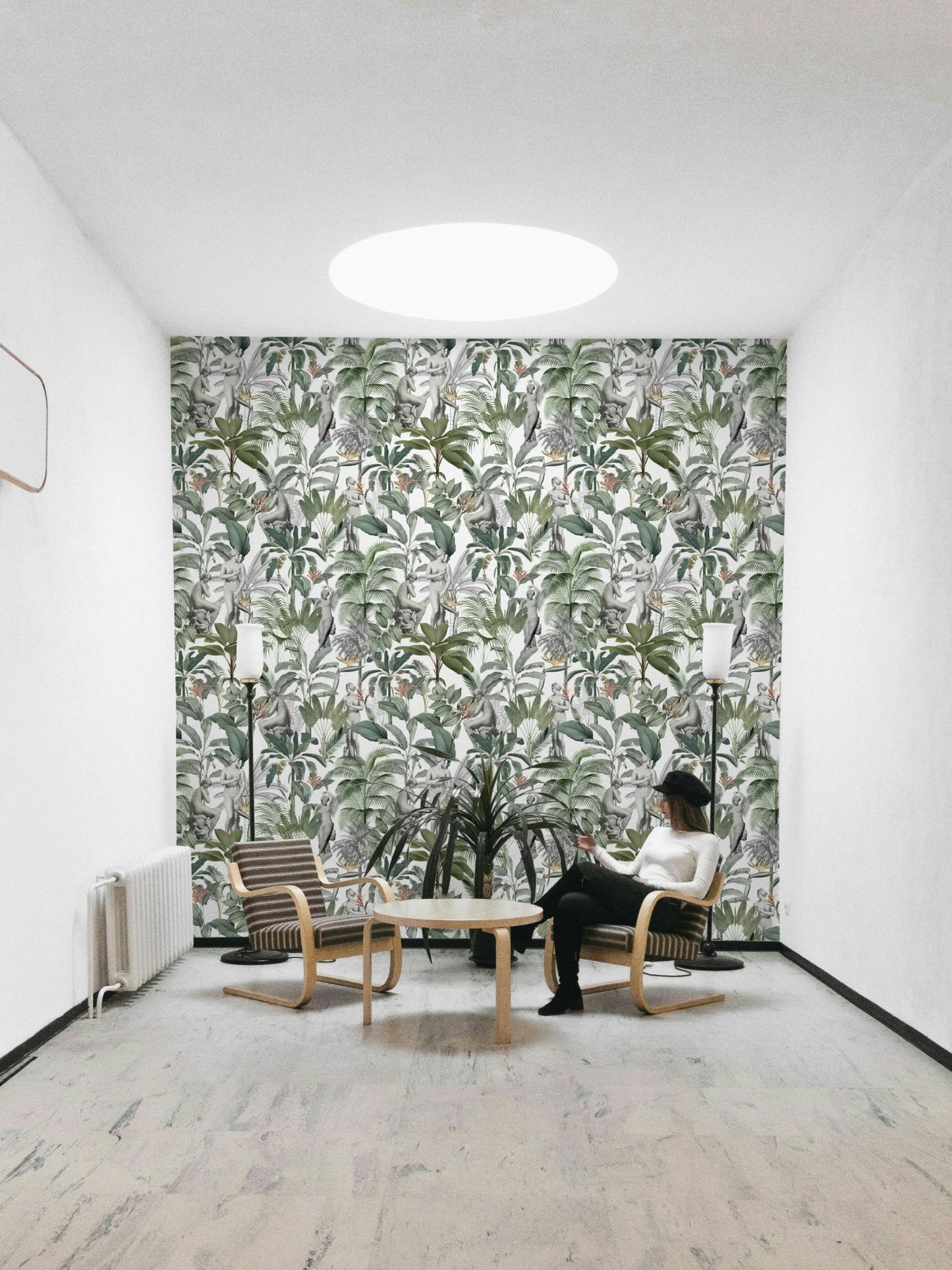 Lush green and neutral-toned tropical wallpaper with bold form

