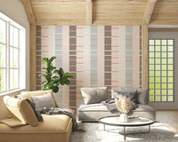 Nursery wall decorated using the soft Sea Drift Wallpaper design.