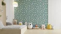 An angled shot of a wall with seashell wallpaper

