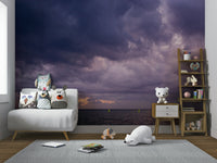 A graceful wave motion wall mural in cool, natural tones.

