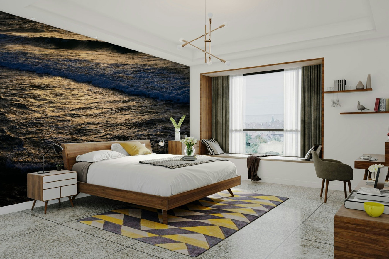 A beautiful coastal rock wallpaper mural with crashing waves.

