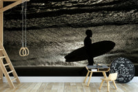 A beautiful coastal rock wallpaper mural with crashing waves.

