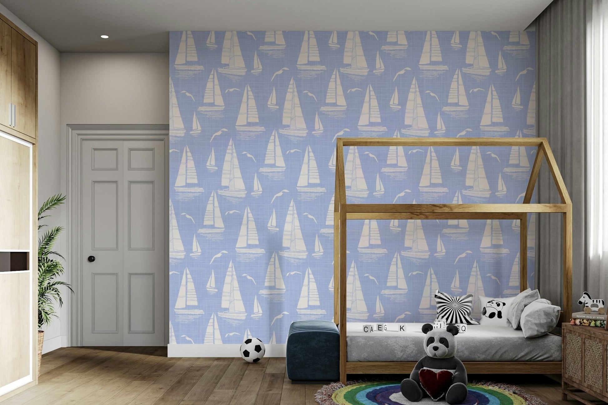 Bedroom decorated with seaside regatta wallpaper

