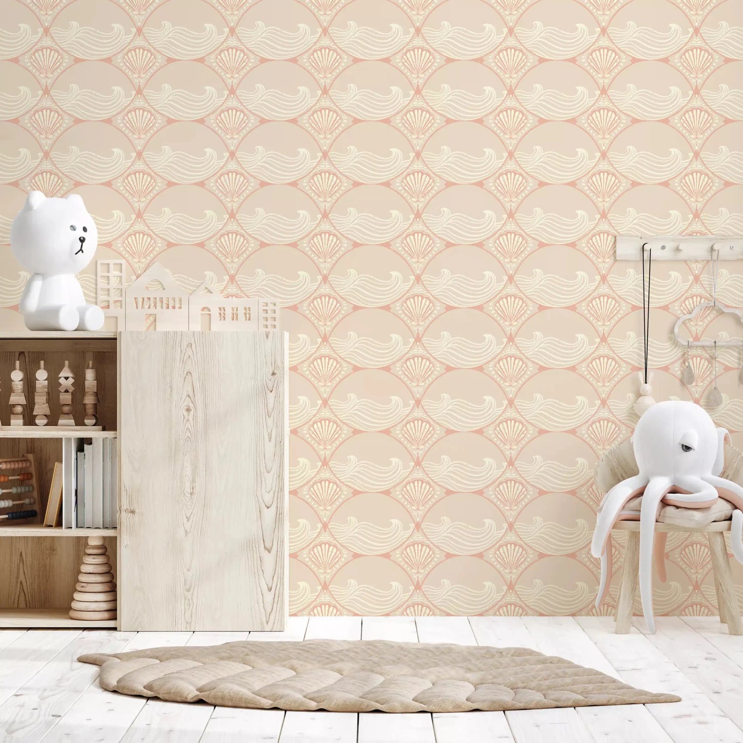 Nursery shows a continuous back wall of the Seaside Serenity Pattern Wallpaper.
