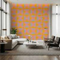 Semi-Circle Pop pattern wallpaper in pink, gray, and gold hues.