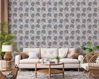 Cozy lounge arrangement enhanced by Serene Blooms Wallpaper and soft lighting