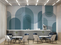 Layered blue mural wallpaper with curves
