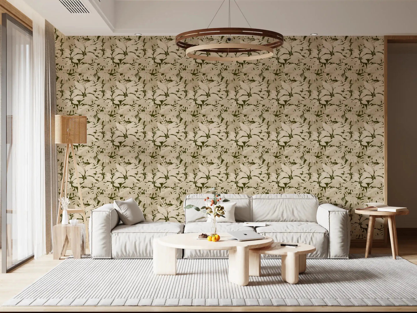 A low white sofa sits against Serene Botanical Rustic Monstera Wallpaper