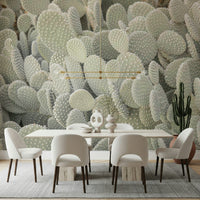 Minimalist desert flora wallpaper mural in a bright guest room.