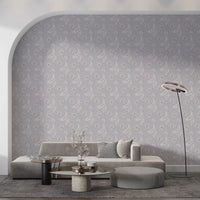 Cozy living corner enhanced by Serene Floral Beige Wallpaper and neutral décor