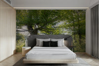 The colors are rich shades of green and earthy browns.

