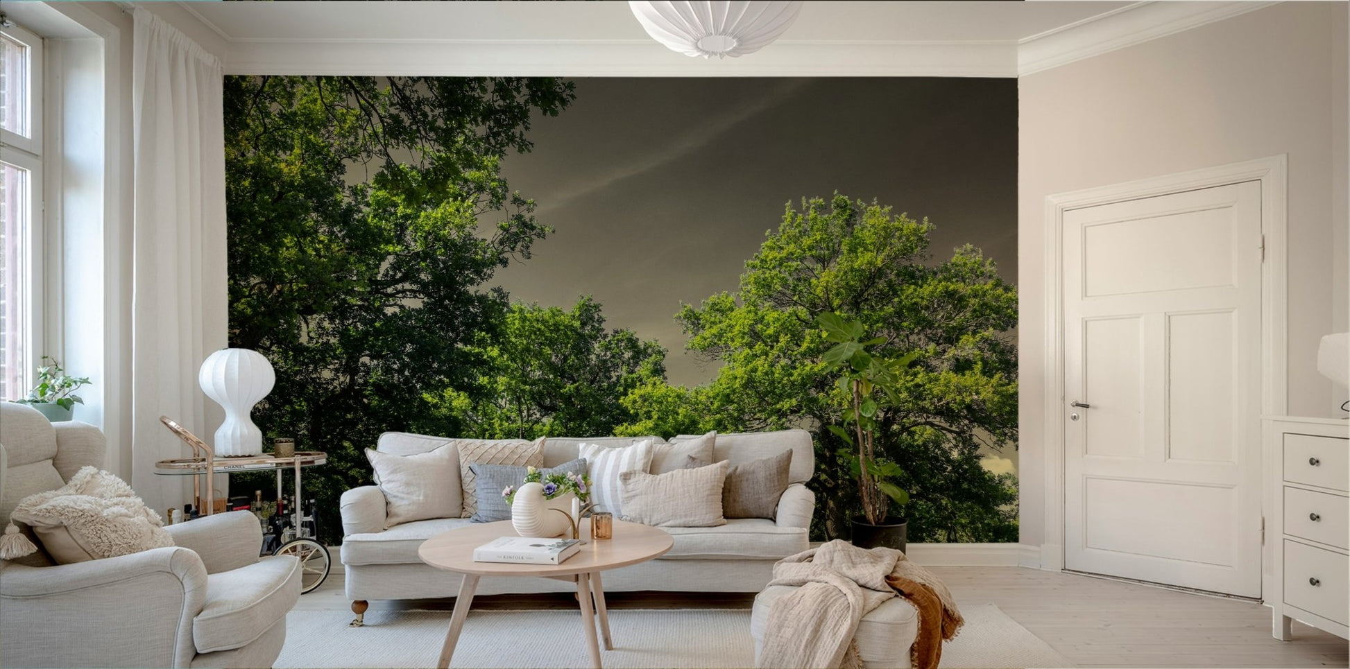 The colors are rich shades of green and earthy browns, contrasting with the sky.

