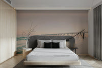 Scenic wall mural with pier and orange sunset hues

