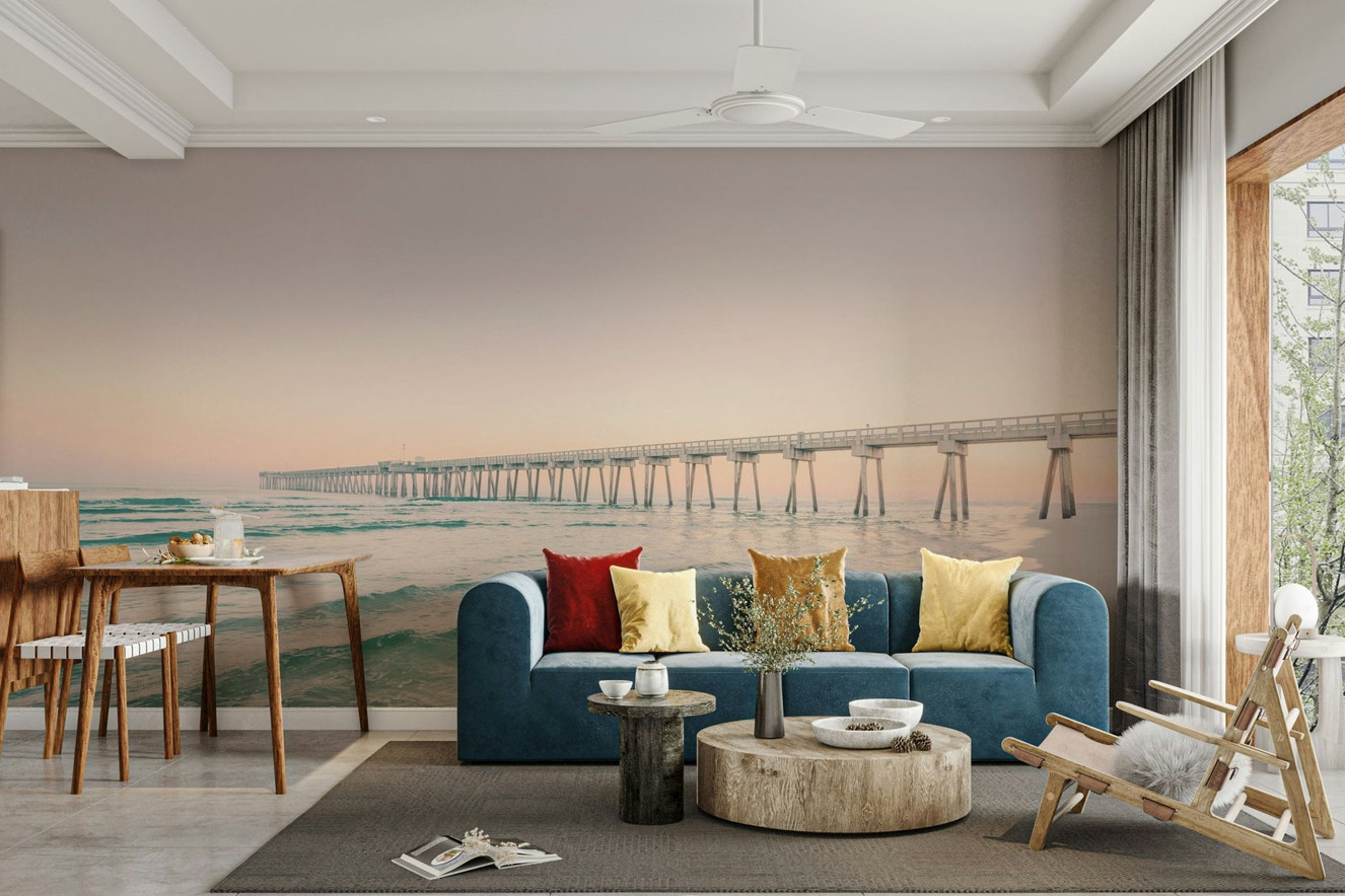 Serene sunset pier wall mural with warm tones

