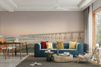 Serene sunset pier wall mural with warm tones

