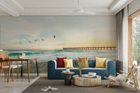 Serene seascape mural with waves and evening light

