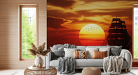 Ship silhouette wall mural with orange sky