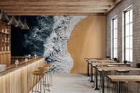 Cafe Dining area opened up by Shoreline Wall Mural with bold aerial coastal movement