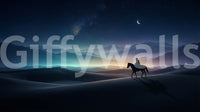 A thin crescent moon glows over distant ridges in this lone rider wall mural.GD9590