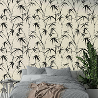 An angled shot of a wall with bamboo wallpaper

