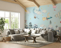 The sky is dotted with fluffy, white cartoon clouds.
