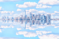 Light blue metropolis wallpaper with a peaceful reflection.