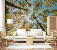 Sun-drenched canopy wall mural in shades of emerald and lime green.