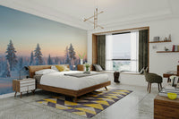 The mural is a realistic photograph of a winter forest at dawn.
