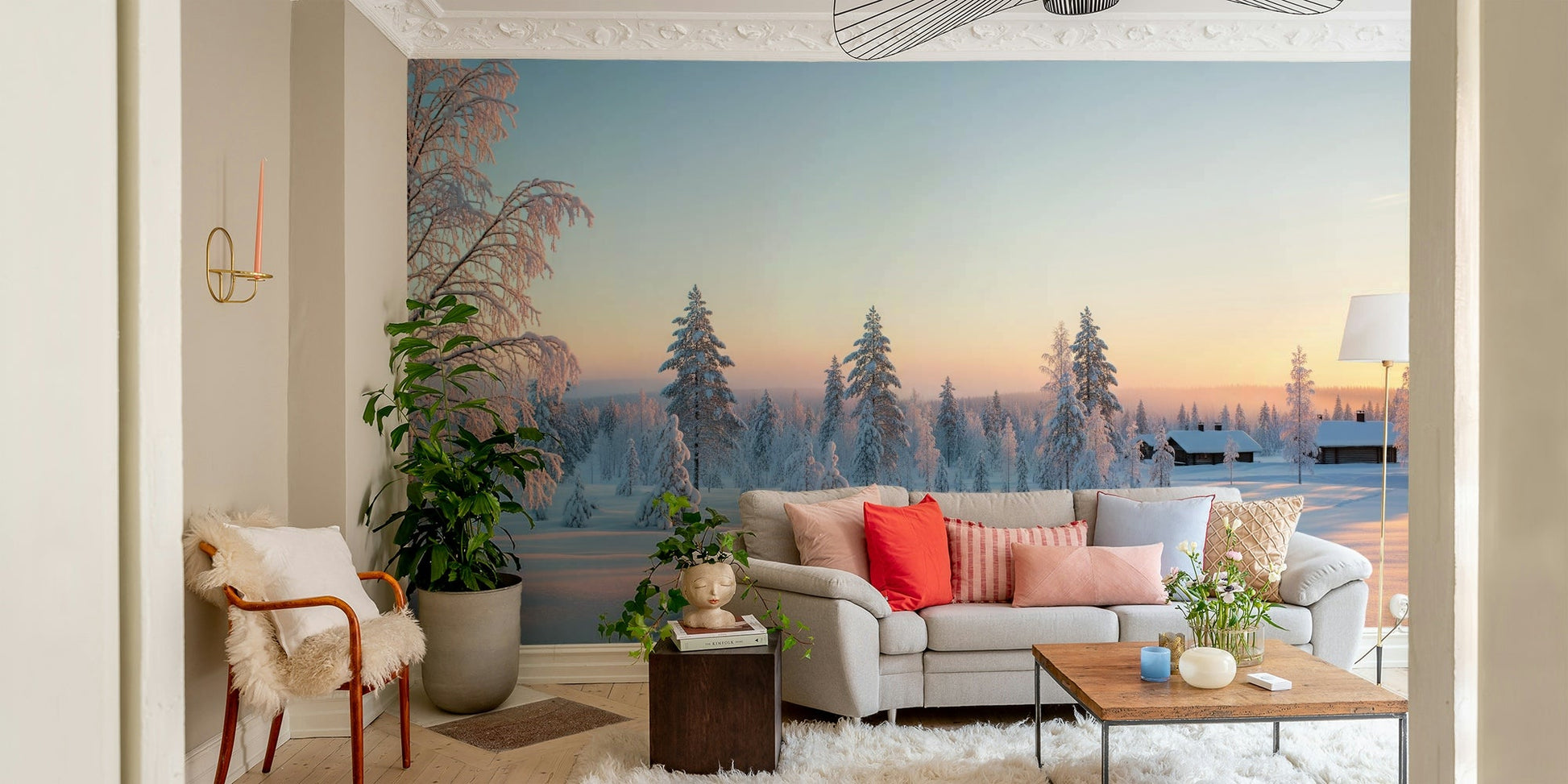 The Snowy Forest Sunrise Wall Mural on a living room wall.
