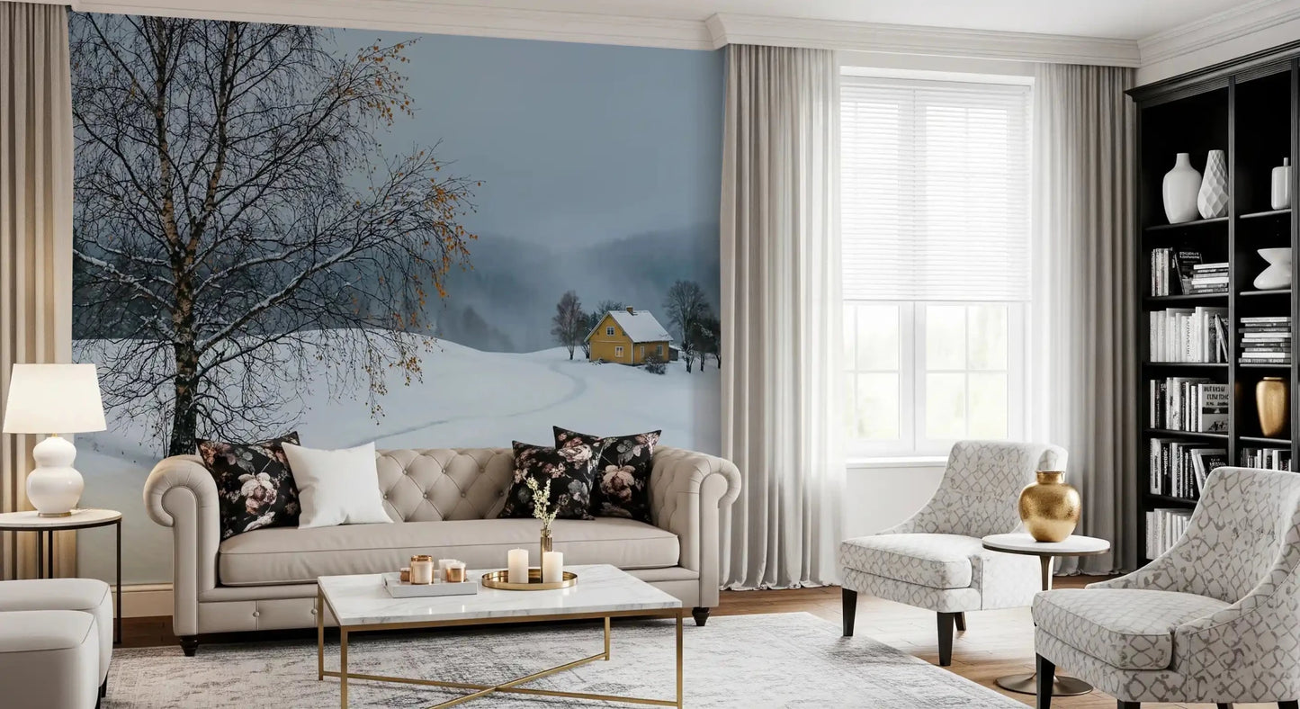 Footprints curve through deep snow toward the yellow house wall mural cottage.GD9529