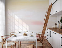 Soft Blush Landscape Wall Mural provides a warm sunset glow in this kitchen interior.