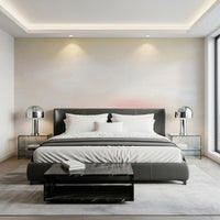 Calm watercolor washes of the Soft Blush Landscape Wall Mural grace this bedroom.
