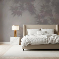 Shadow leaf pattern wallpaper for a calm master bedroom.