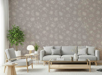 Leaves scatter between the flowers in this Soft Taupe Florals wallpaper GD7419
