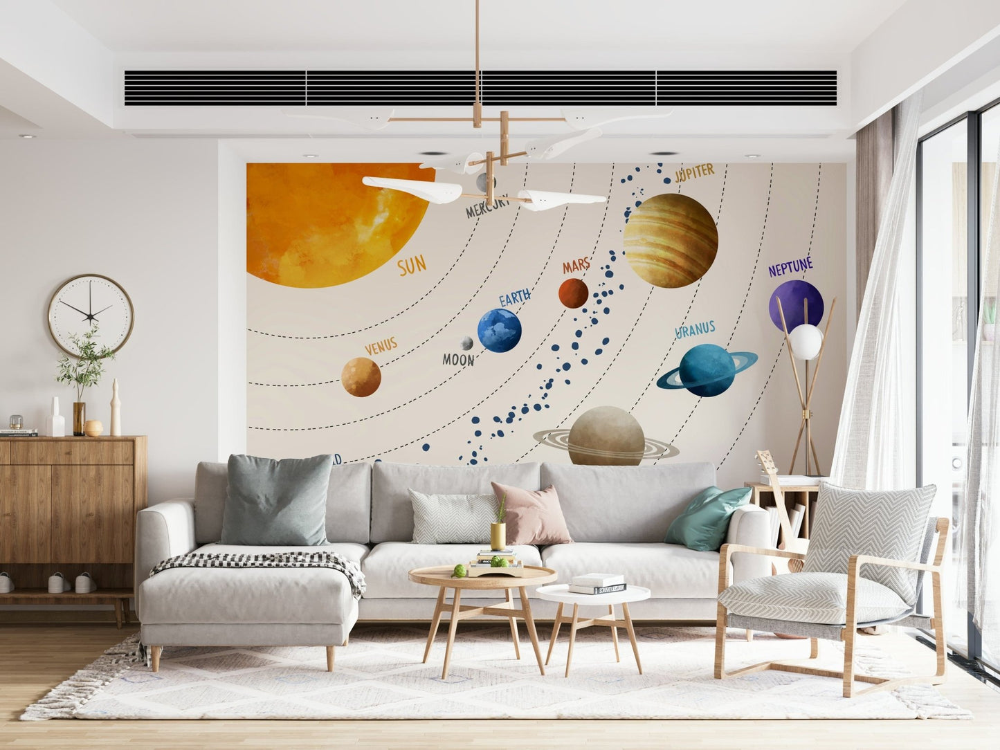 A bright open lounge gains colorful learning charm from Solar System Art Wall Mural