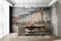 Soft color houses on cobblestone street mural


