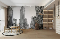 Urban life depicted on a wall.

