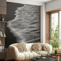 The wallpaper is used as a feature wall in a bedroom.

